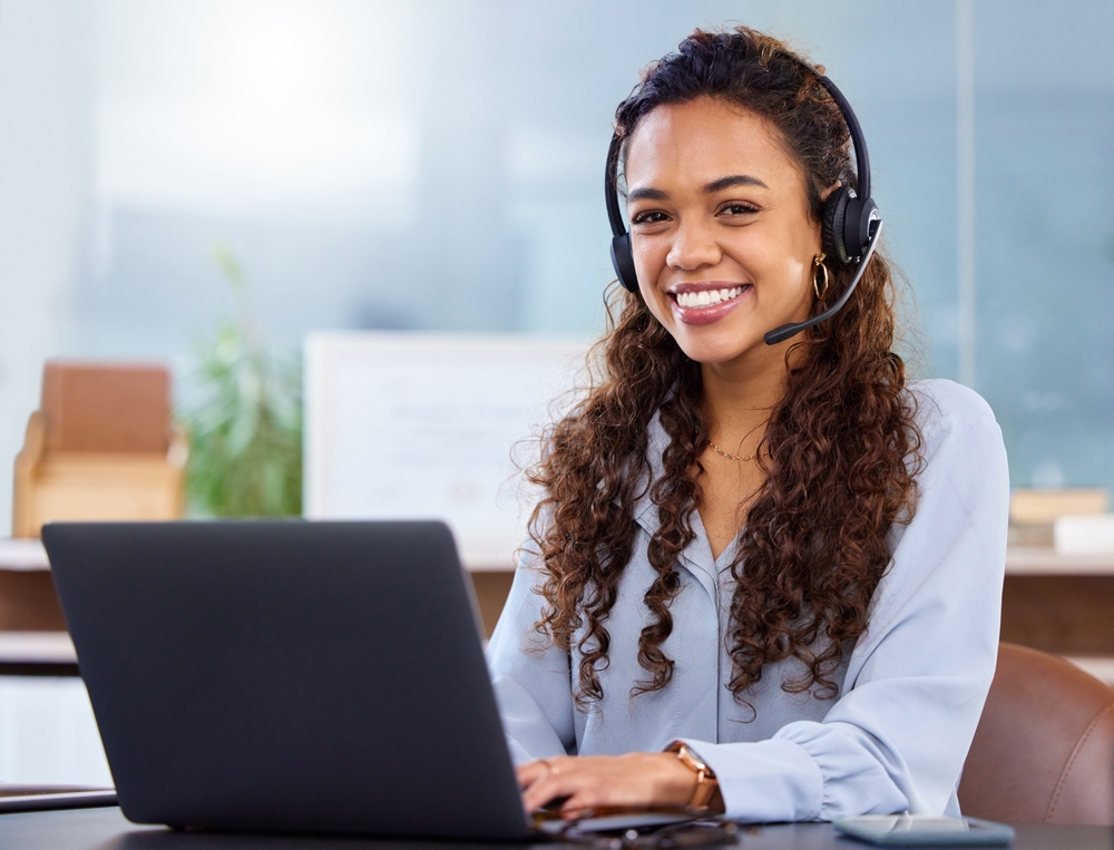 Woman,,Laptop,And,Call,Center,Agent,With,Smile,For,Customer