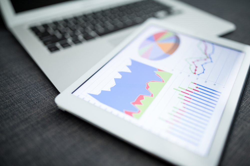 Business,Charts,And,Diagrams,On,Digital,Tablet